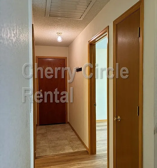 Hallway on first floor to second bedroom and bathroom