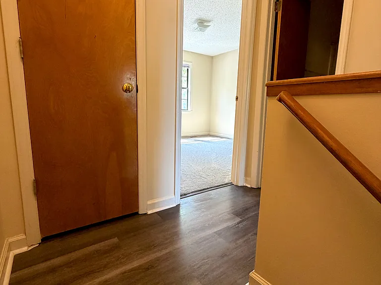 upstairs hallway, looking into front bedroom