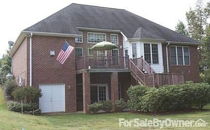 4707 Crystal Cove Place
						:
						Exterior back of home facing private cove on Lake Hickory