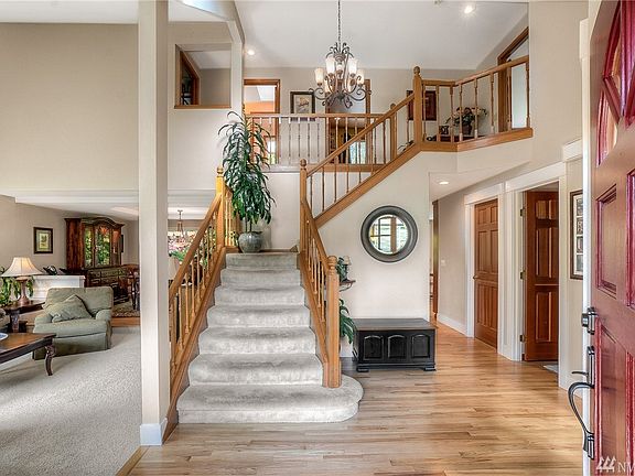 Soaring ceilings and gleaming hardwoods!   All new paint!