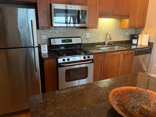 Plenty of cabinets and fully stocked with all plates, glasses, wine glasses, cookware, utensils, coffee maker.