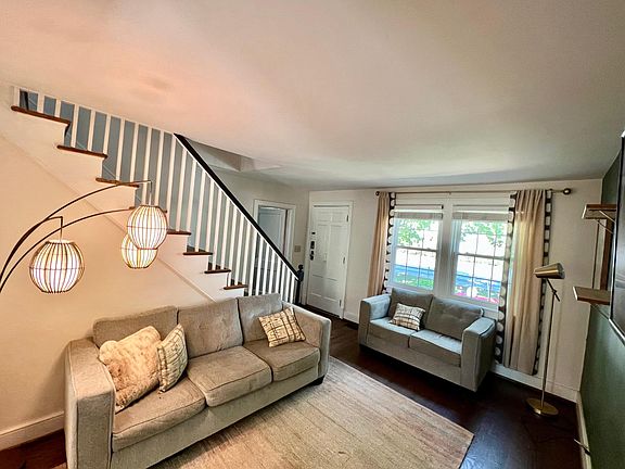 Living room with 2 couches and smart TV