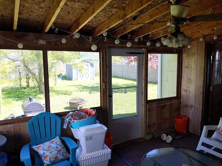 3-season sunporch overlooks the yard - fenced on 3-sides.