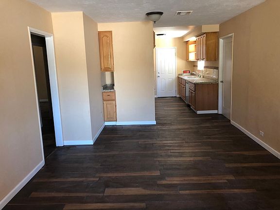 Remodeled kitchen with granite counters as well as built in dishwasher and stove.