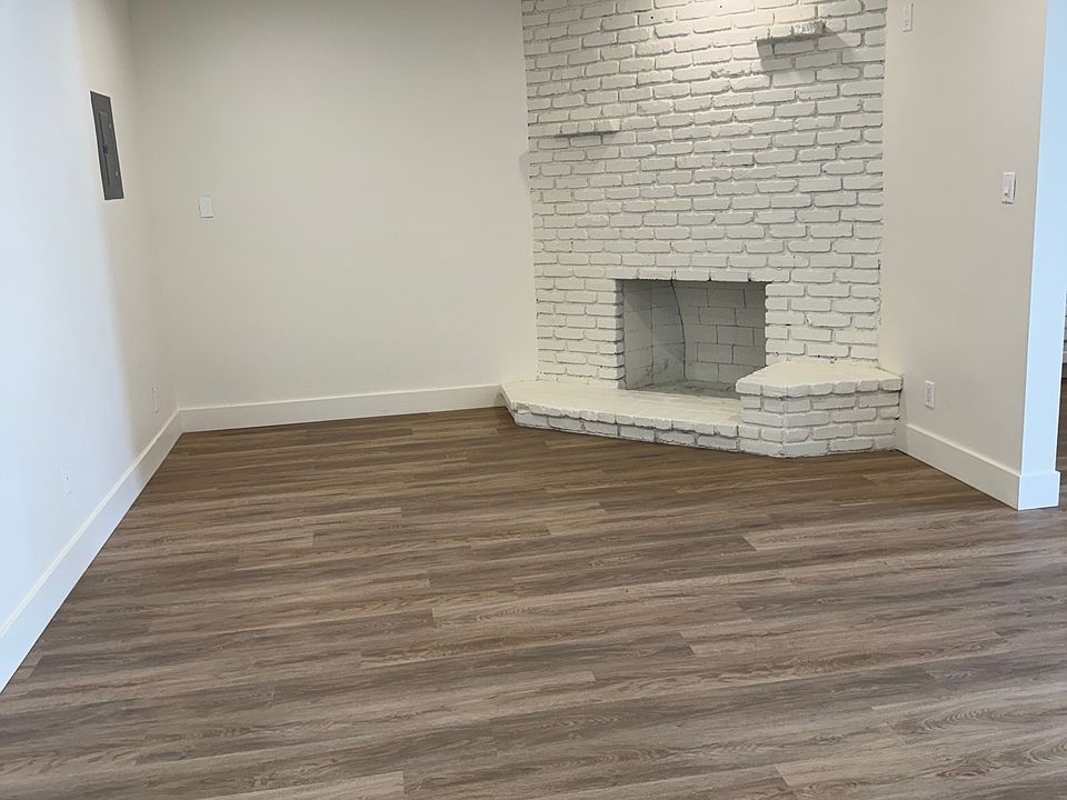 Spacious living room with fireplace