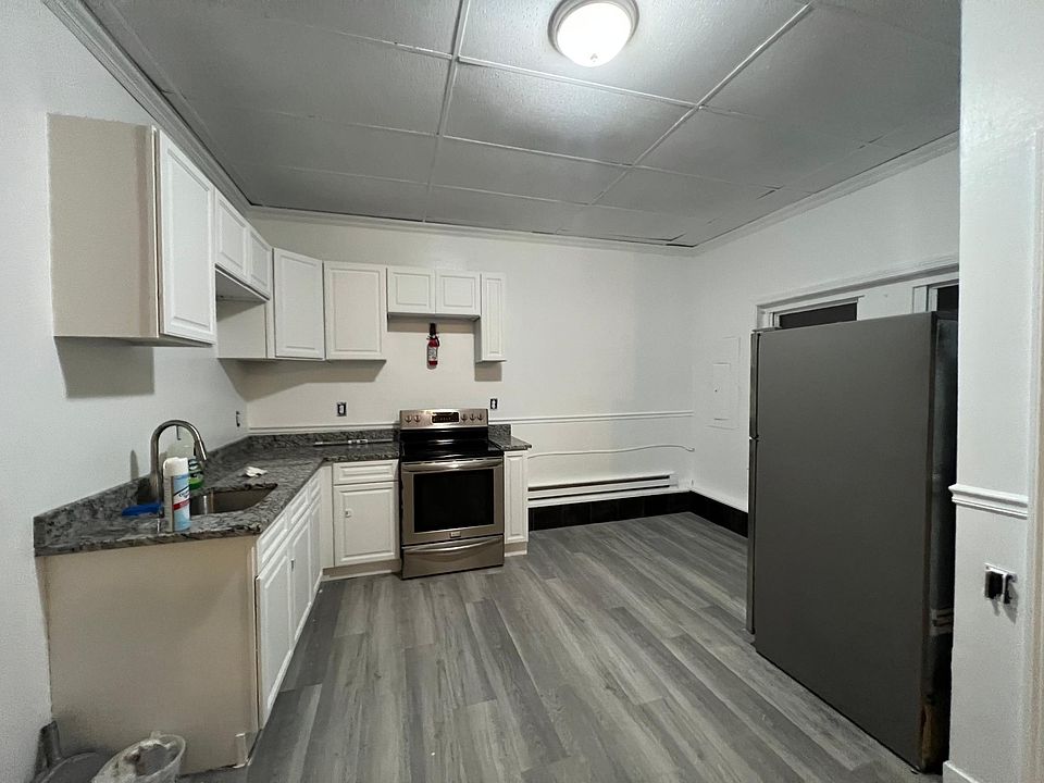 Kitchen with granite counter tops and stainless steel appliances