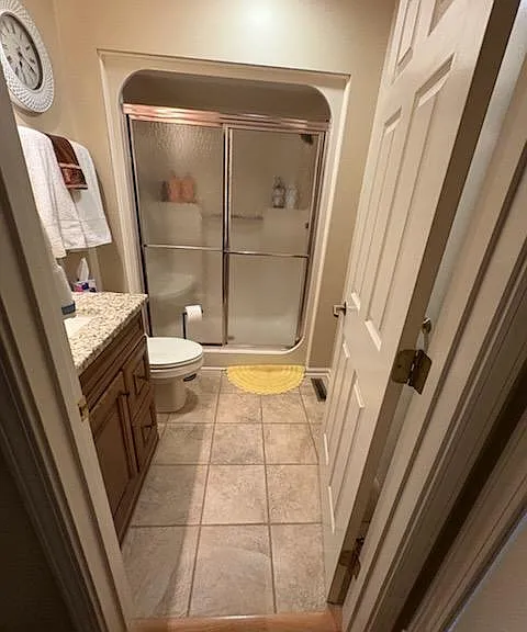 Full bathroom shown from front bedroom door.