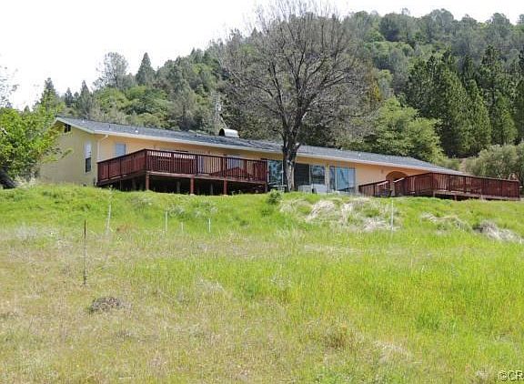 Front of home in secluded mountain setting