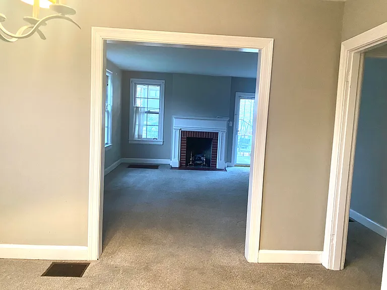 Dining Room / Living Room with door to porch