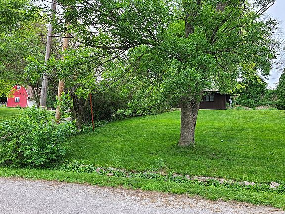 North end of yard, up to garage