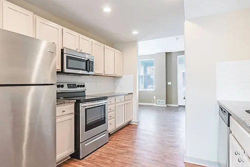 New Village Homes & Whitney Young Townhomes Photo 1