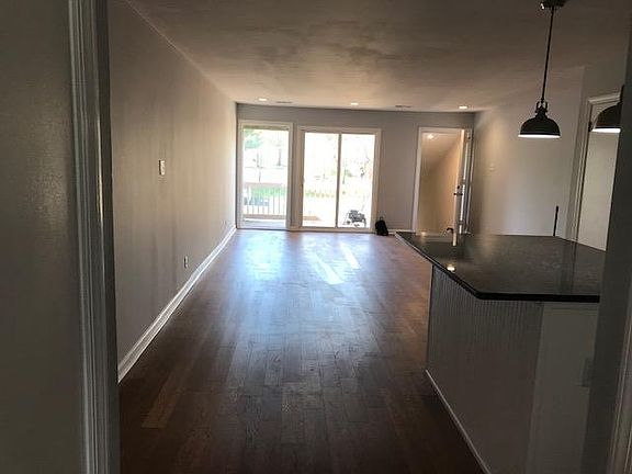 view of living room/dining room and sliders to deck