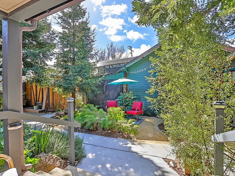 From front porch looking to the courtyard area and outdoor seating.