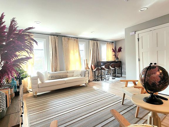 Tons of Lighting and absolutely spacious Living Room