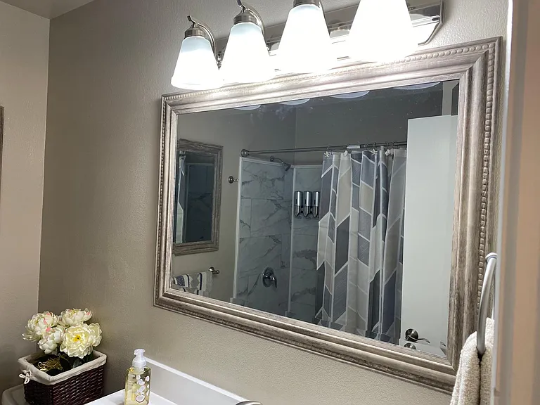 Upstairs tub/shower new vanity and light bar_