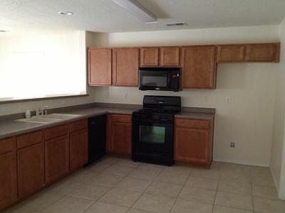 4th image of 10931 Tanzanite Dr NW