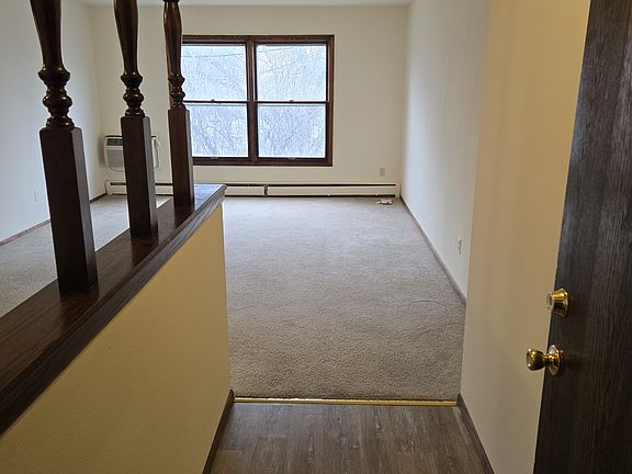 Entry to open concept kitchen to living room.