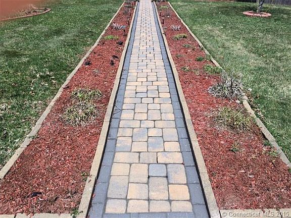 Professionally landscaped w...