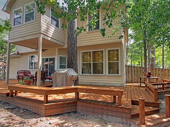 Built-in seating around backyard deck.