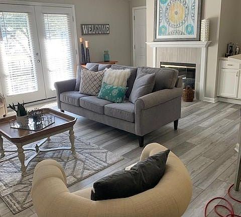 Spacious living room brand new floors.