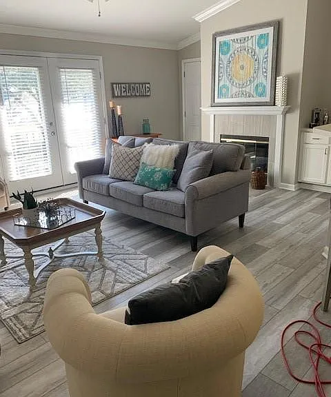 Spacious living room brand new floors.