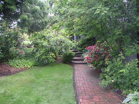 Hundred's of perennial plantings amid professional landscaping