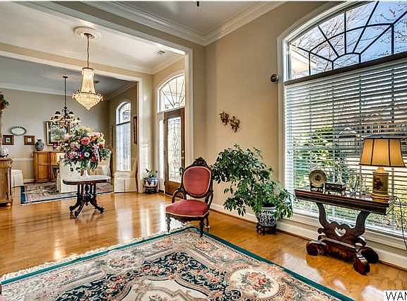 View from formal living room to foyer and formal dining room