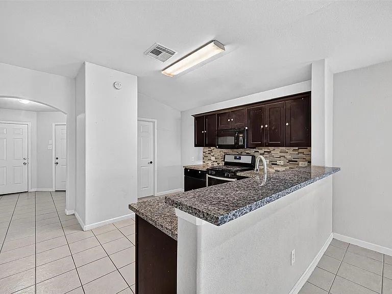10907 Barker Gate Ct — Photo 15