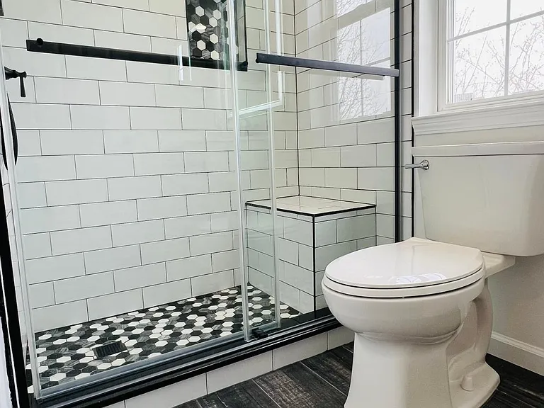 New Guest Bathroom in Hallway - shows seated bench for shower