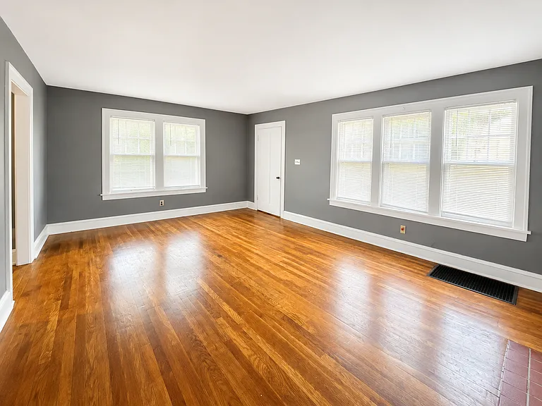 Main living room, large spacious room with built-in cabinets, plenty of natural lighting, neutral colors through out the unit. (Additional angles of this room later in listing)