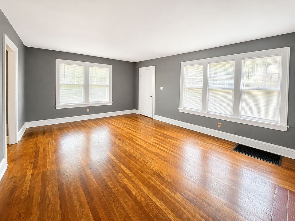 Main living room, large spacious room with built-in cabinets, plenty of natural lighting, neutral colors through out the unit. (Additional angles of this room later in listing)