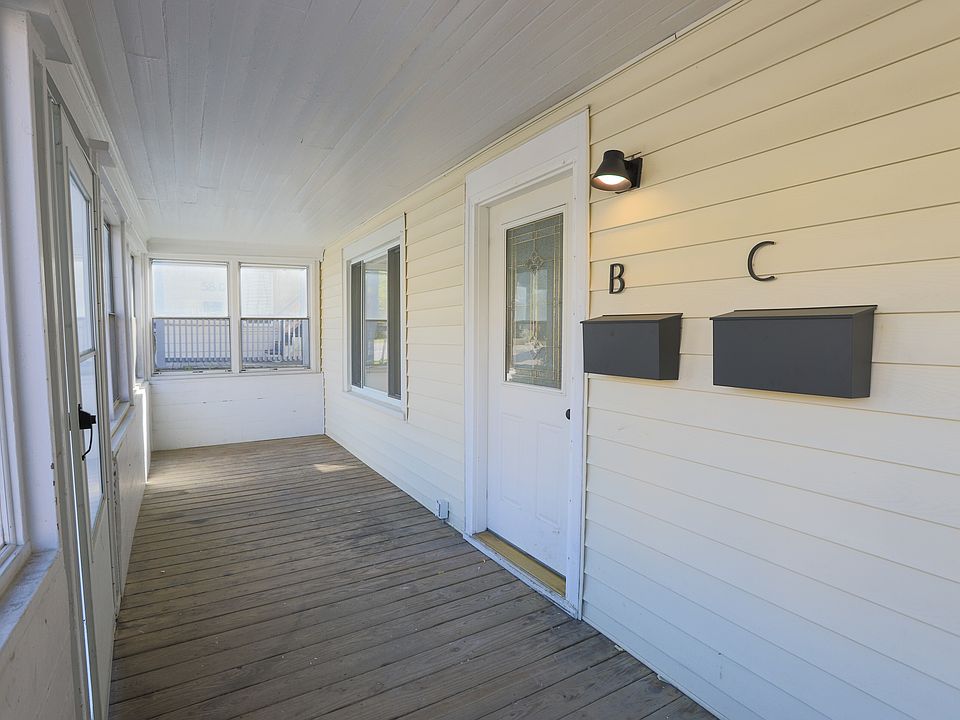Street level - front entrance - covered porch for locking bikes