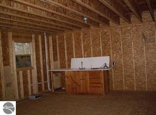 10340 SW Torch Lake Dr, Rapid City, MI 49676
