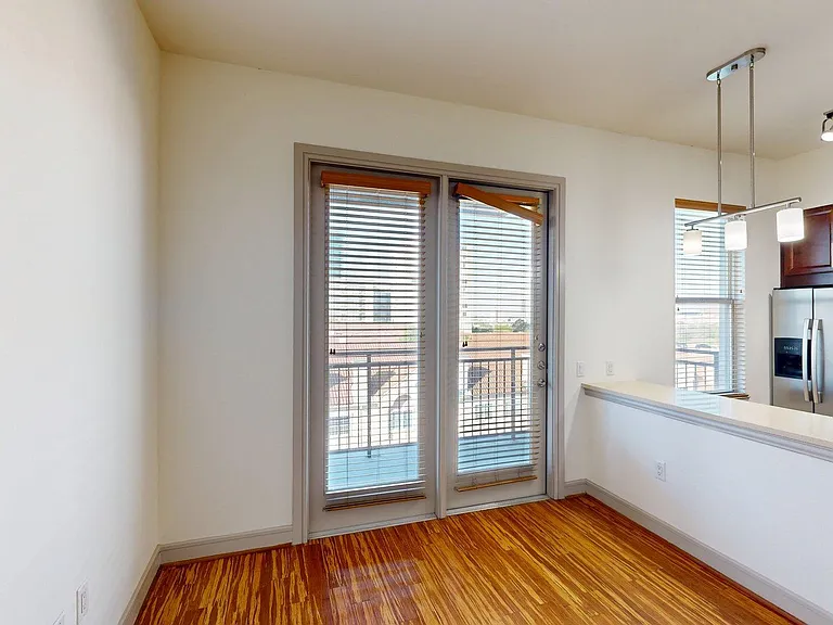 Apartment Living Room with Wood Style Flooring.