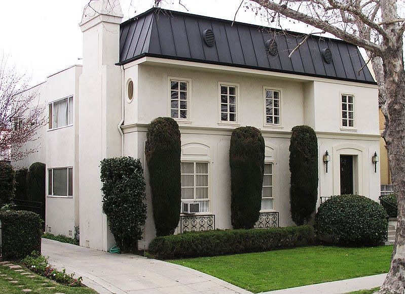 French style facade of this duplex on a great block!