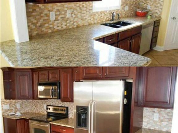 Granite countertops, Stainless steel appliances, travertine