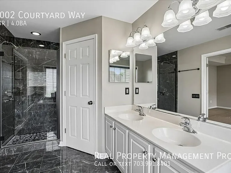 7002 Courtyard Way — Photo 22