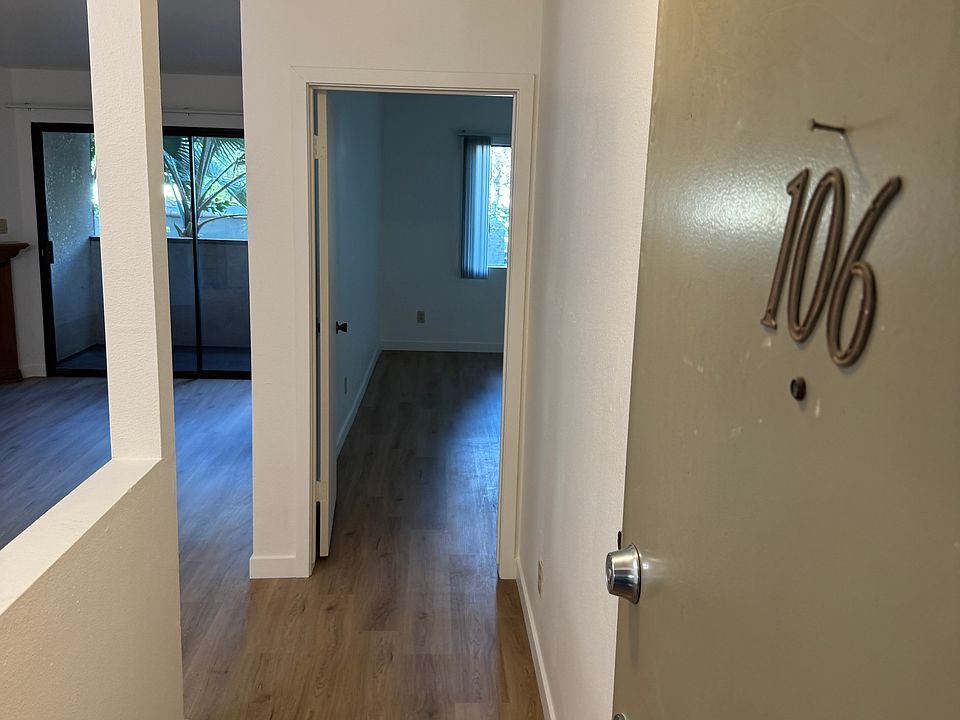Entryway to bedroom and living room.
