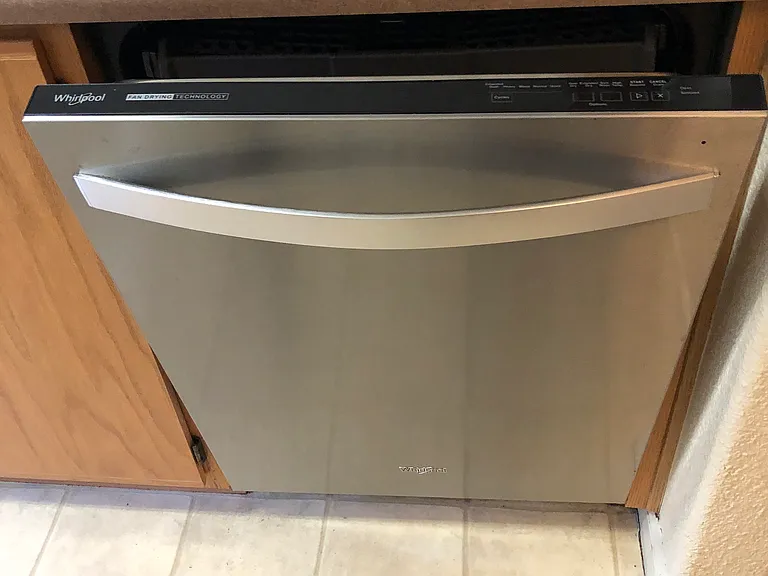 Newer 3 tray Whirlpool dishwasher.