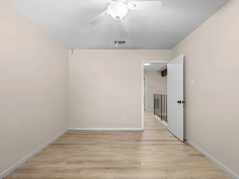 Second bedroom upstairs. Great for an office, nursery, or regular bedroom.