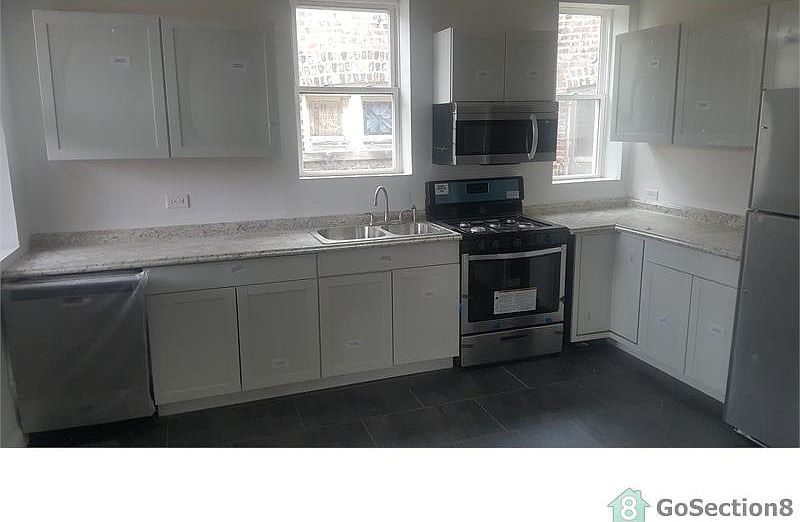 1st image of 6148 S Langley Ave #2