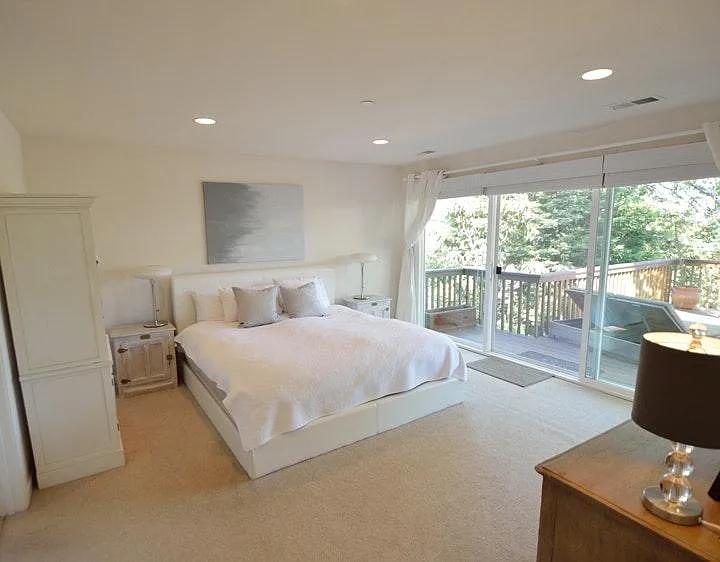 Master bedroom with access to deck and hot tub