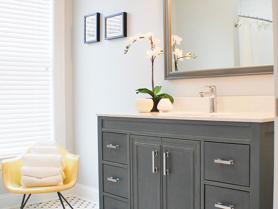 Bath vanity area.
(furniture and decor not included)