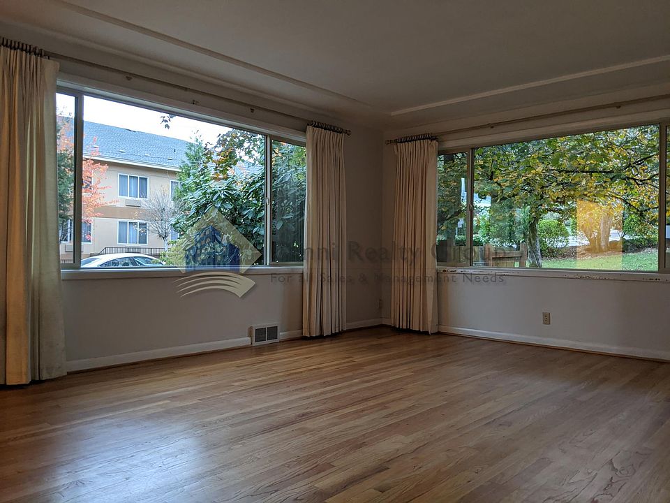 Big Windows & Beautiful Hardwoods in Living Room