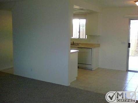 Living room, dinning room, kitchen with slider to rear patio