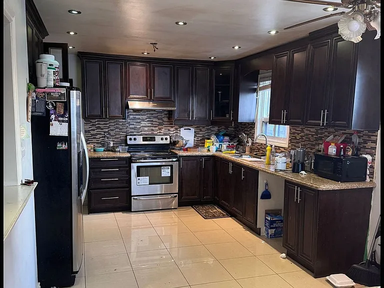 7221 Sigsbee Dr — Photo 3
