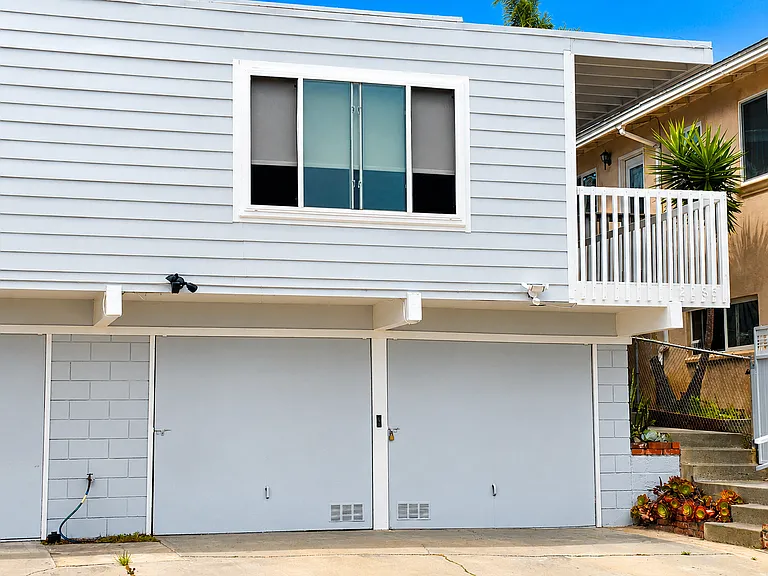 Two-car garage plus two off-street parking spaces
