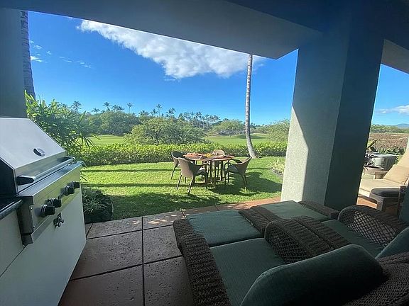 Private lanai includes Viking grill, patio and lounge furniture