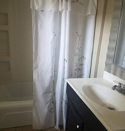 Bathroom with tub/shower unit

