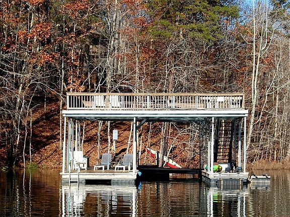 Dock has slips including jet ski lift